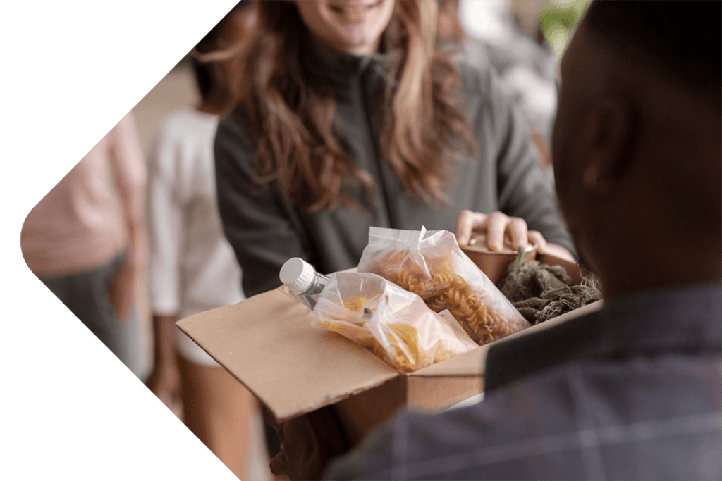 someone donating food to a charity